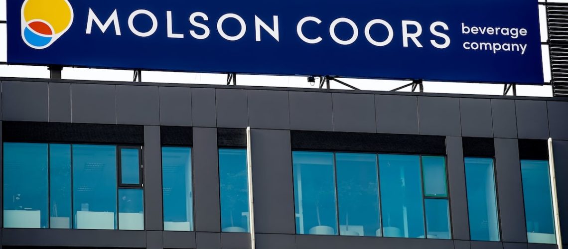 Bucharest, Romania - January 21, 2021: A logo of Molson Coors Beverage Company, Canadian multinational drink and brewing company headquartered in Chicago, is displayed on the top of a building.