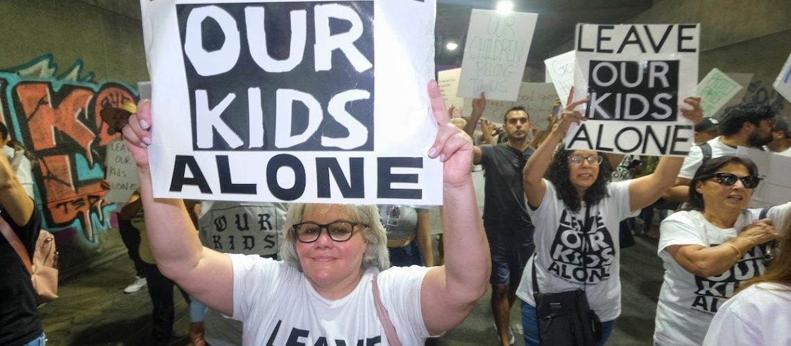 parent child protest LGBTQ book