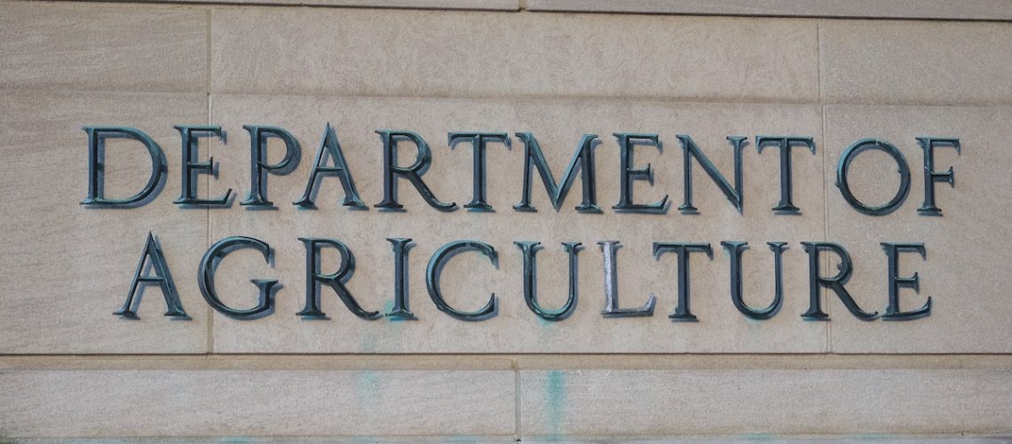 Washington, D.C. - United States - June 18, 2024: Exterior of Building of Department of Agriculture and a metallic writing that says Department of Agriculture on stones