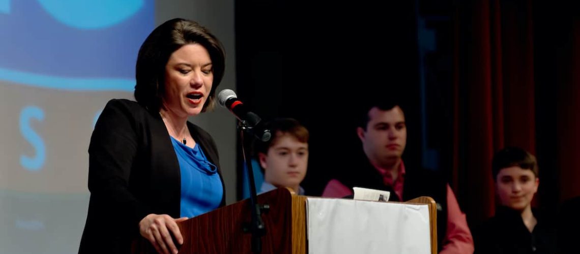 SHAKOPEE, MINNESOTA - APRIL 30, 2016: Congressional candidate Angie Craig gives acceptance speech after her endorsement at local Democratic Party Convention in Shakopee on April 30.